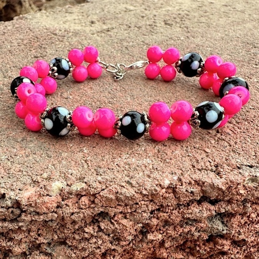 Pink and Black Glass Beaded Bracelet with Silver Colored Accents